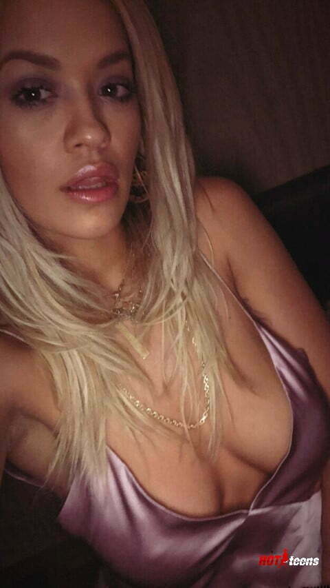 Deep cleavage of Rita Ora seeing part of her nude tits