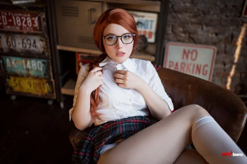 Nerd cosplayer taking nudes in high school