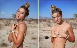 Topless Charly Jordan hiding boobs in the dessert
