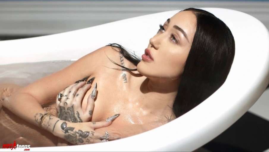 Naked Noah Cyrus in bathtub model photo